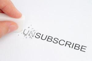 Hand erase part of the unsubscribe email concept