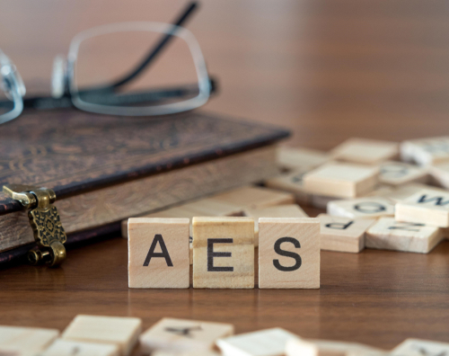 the acronym aes for Advanced Encryption Standard concept represented by wooden letter tiles