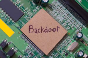 Backdoor word written on a paper and placed on a PC chip