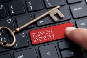 finger on keyboard with word PASSWORD SECURITY secure password policy concept