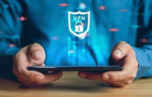 VPN Virtual Private network protocol concept Man hand using Smartphone with vpn icon on screen